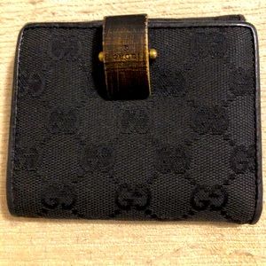 Authentic pre-loved Canvas and Leather Unisex wallet